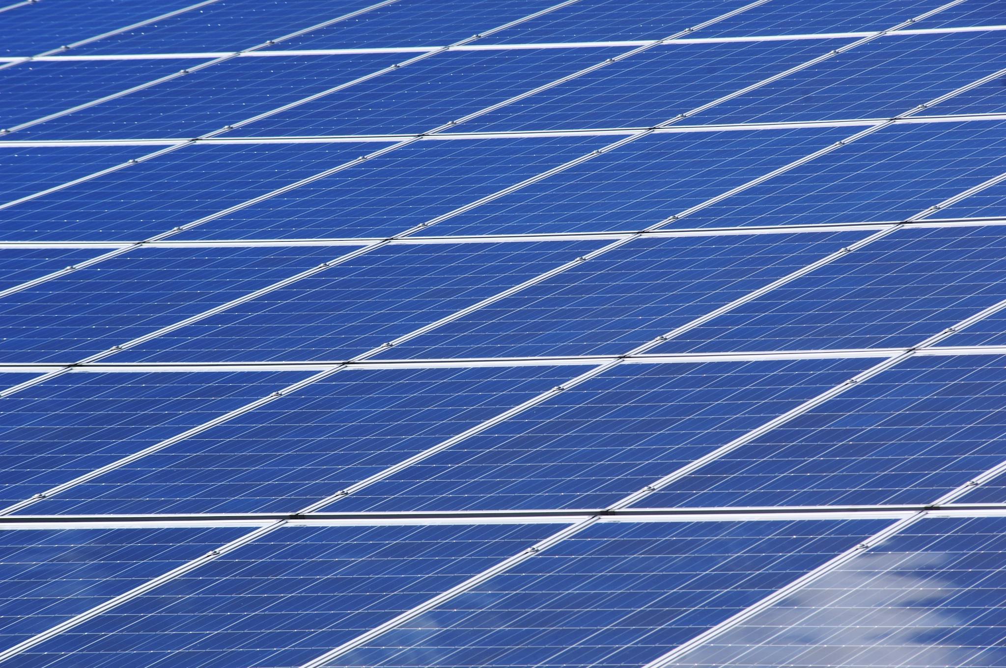 a group of sun power solar panels installed